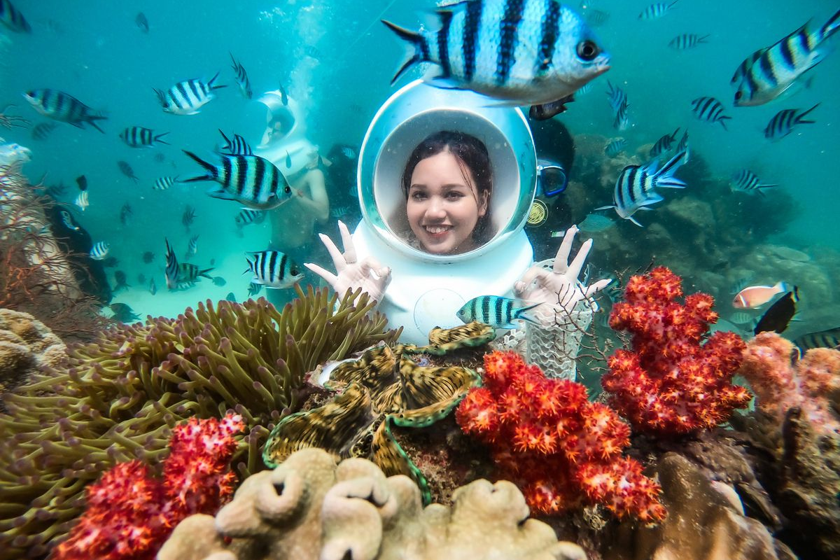 Tourists snorkeling in the clear waters of Phu Quoc